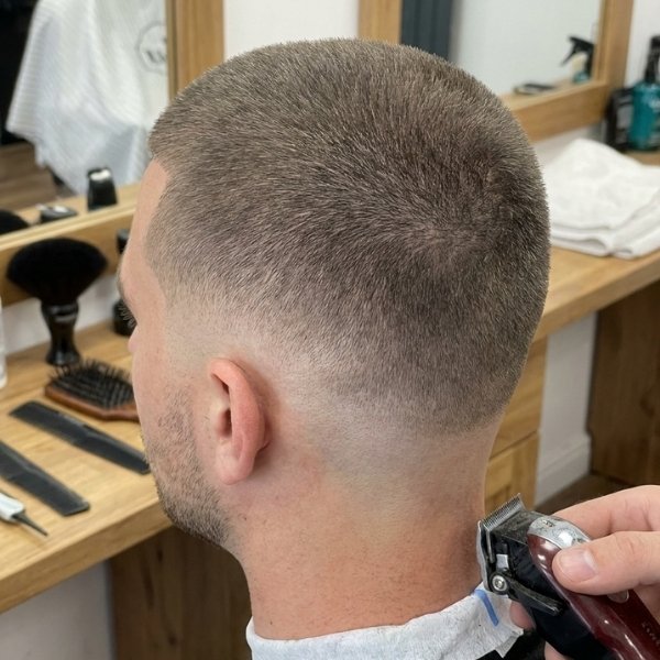 6 Guard Buzz Cut Low Taper for a Subtle and Clean Style